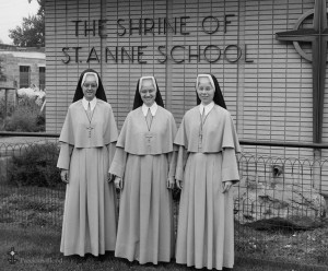 Sisters of the Precious Blood, standing in front of Shrine of St. Anne School